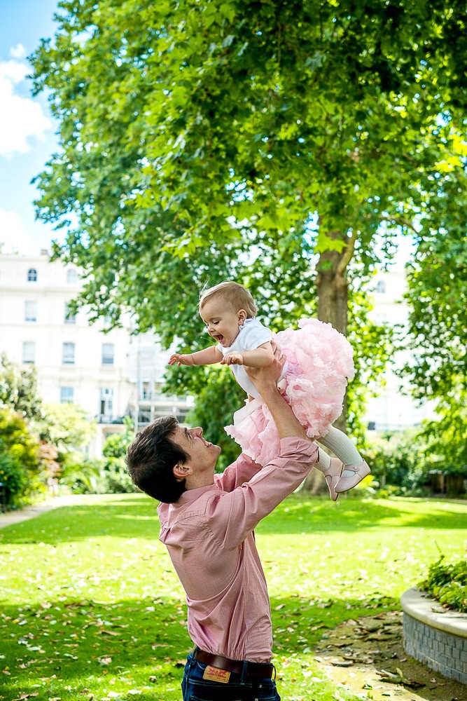 1st birthday photoshoot outdoor baby girl with dad