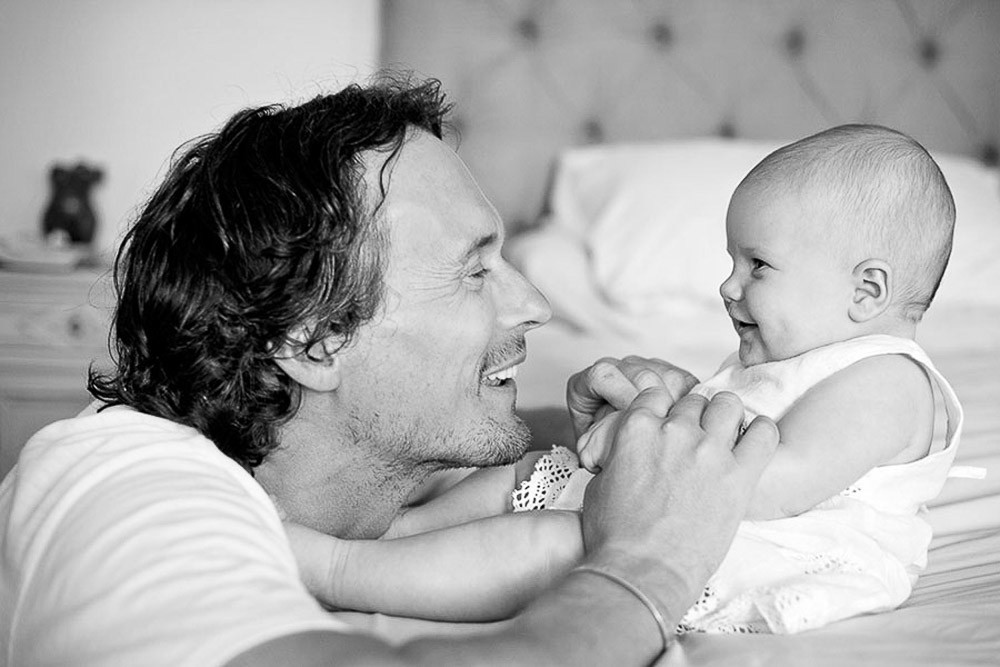 lifestyle family photography with a baby at home