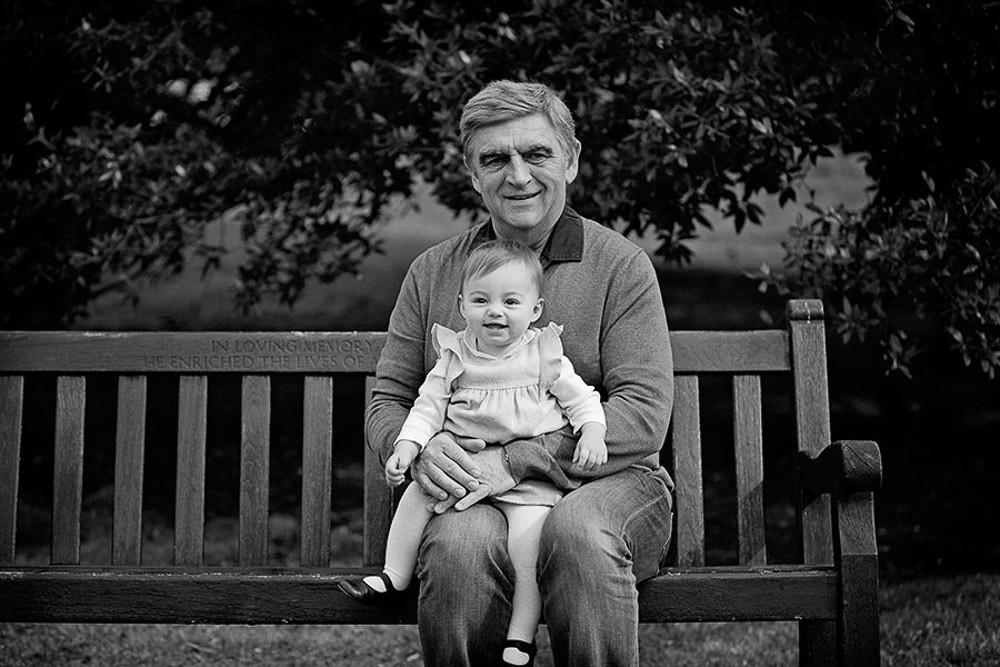 multi-generational family photoshoot outdoor with granddad