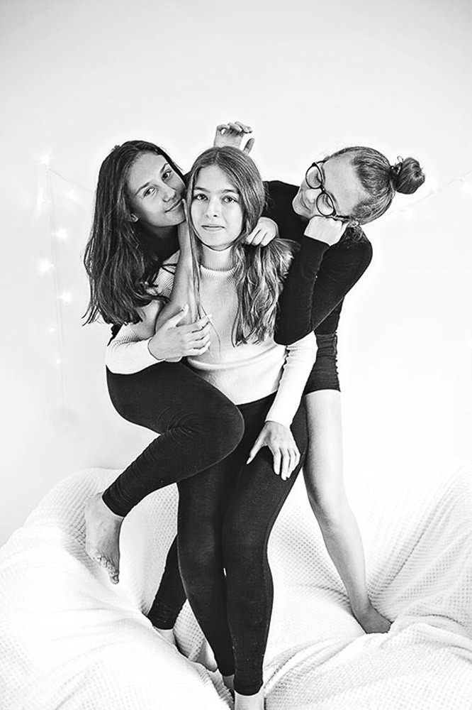 black and white family photoshoot with teens