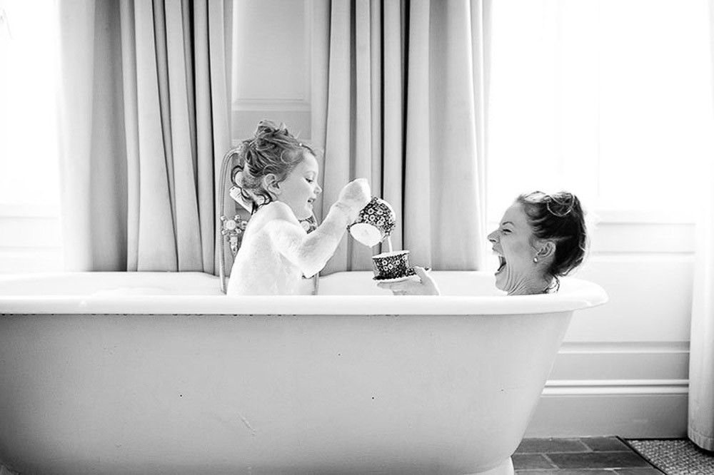 mother and daughter bath time photoshoot