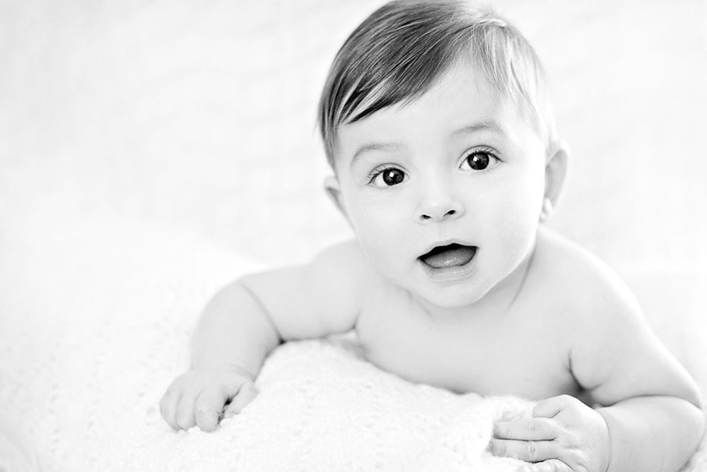 black and white professional baby photoshoot in a studio London