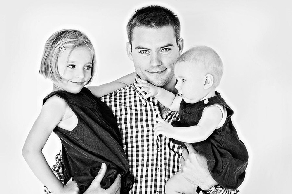 studio family photoshoot with two daughters