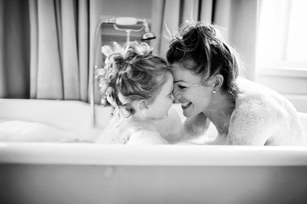 mother and daughter bath photography at home 