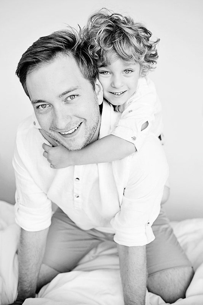 father and son portrait at home